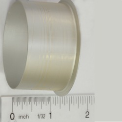 picture of small diameter gold wire on a spool